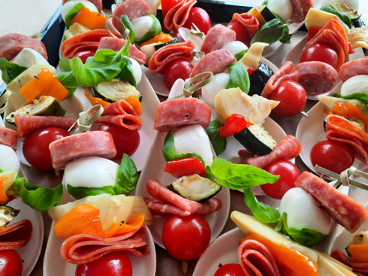 Cold appetizers | Assorted antipasto skewer (olive, bocconcini, tomatoes, peppers, chorizo, artichokes, salami...)