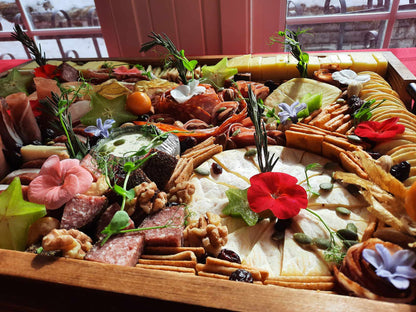 Charcuterie and assorted fine cheeses platter